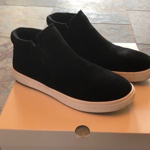 Fabletics black suede high tops in box.
